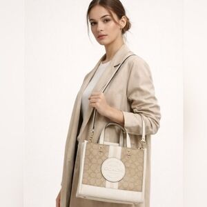 Coach Dempsey Carryall Signature Jacquard bag